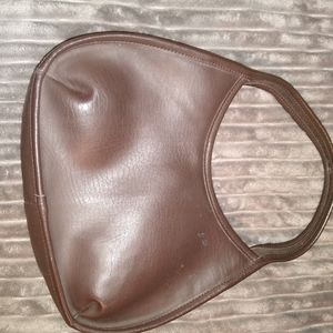 Small brown leather handbag